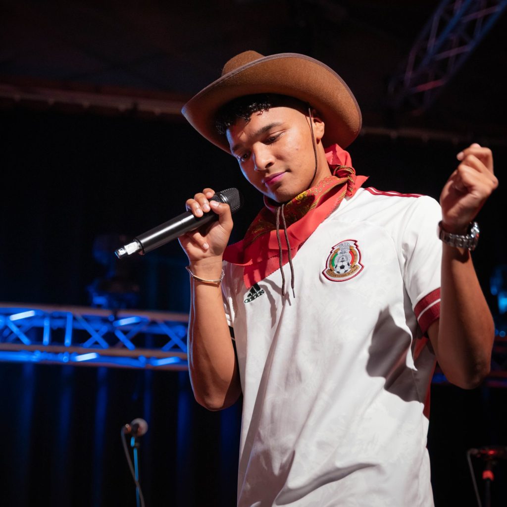 Leosscrew performing a powerful Mexican rap set, blending freestyle and cultural influences.