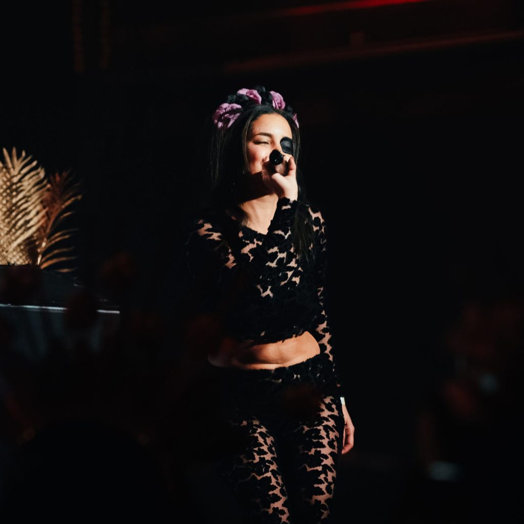 Danisha performing urban rhythms during Día de Muertos at The Latin Experience.